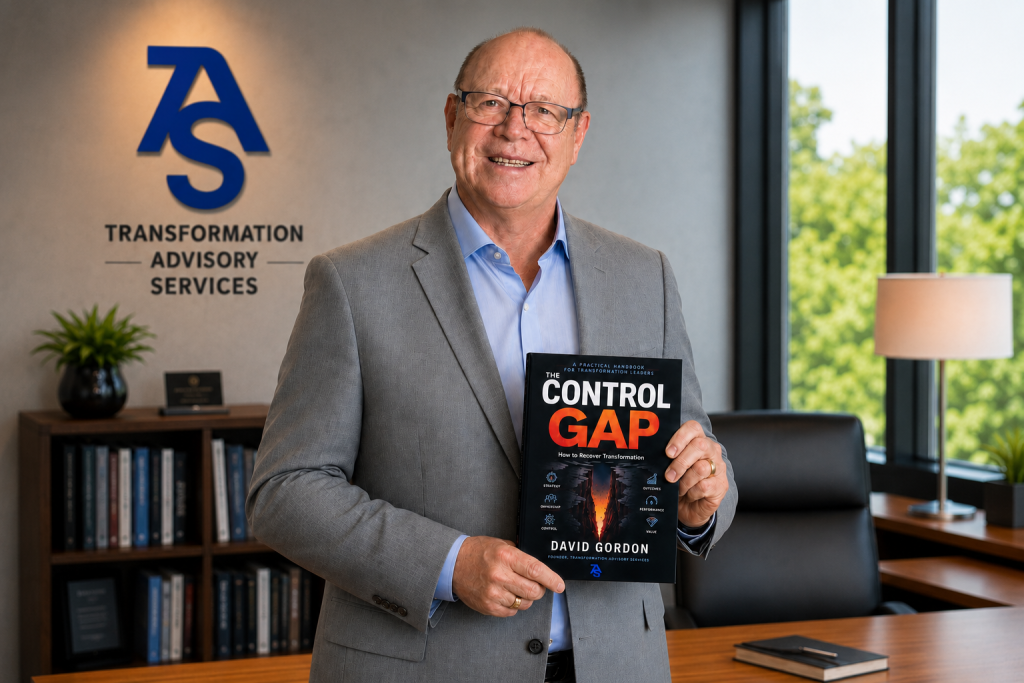 David Gordon, founder of Transformation Advisory Services, holding The Control Gap