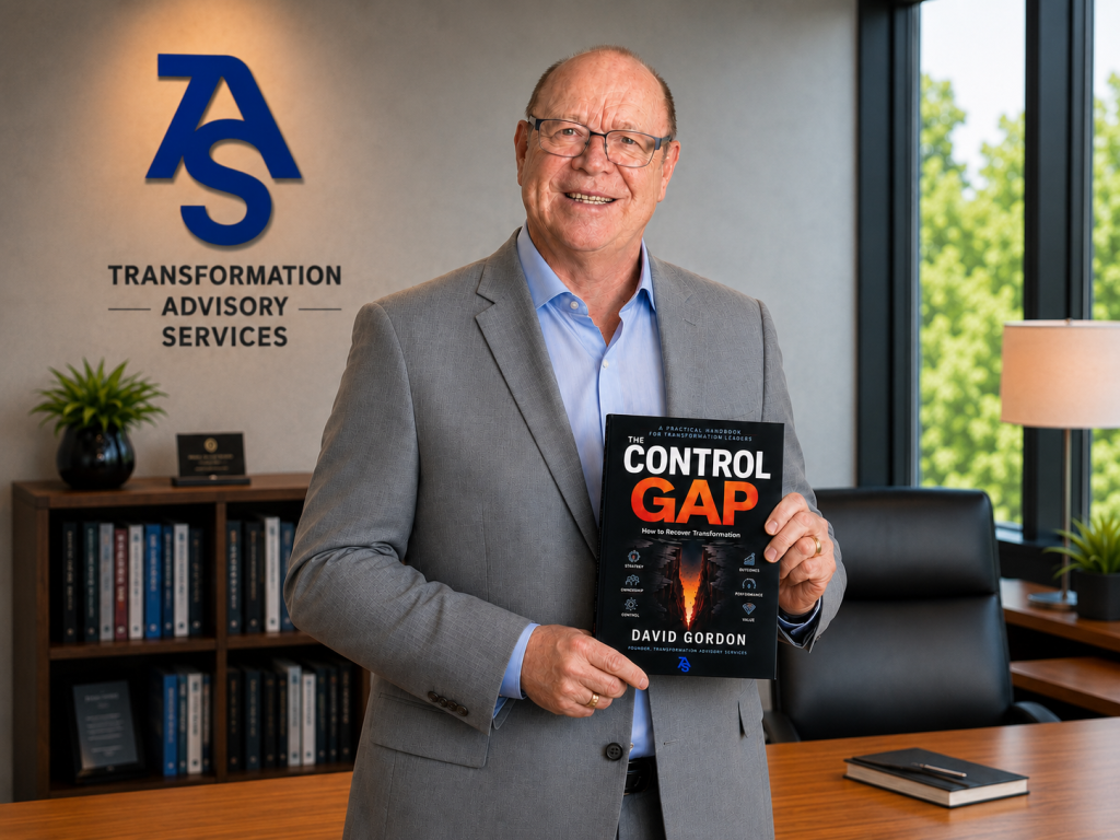 David Gordon, founder of Transformation Advisory Services, holding The Control Gap